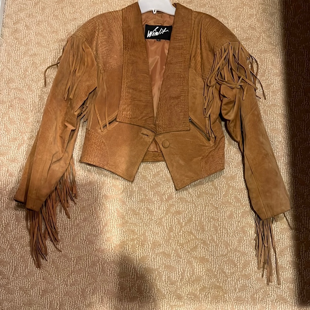 Beautiful leather woman’s jacket .Nylon taffeta lining with zipper pockets